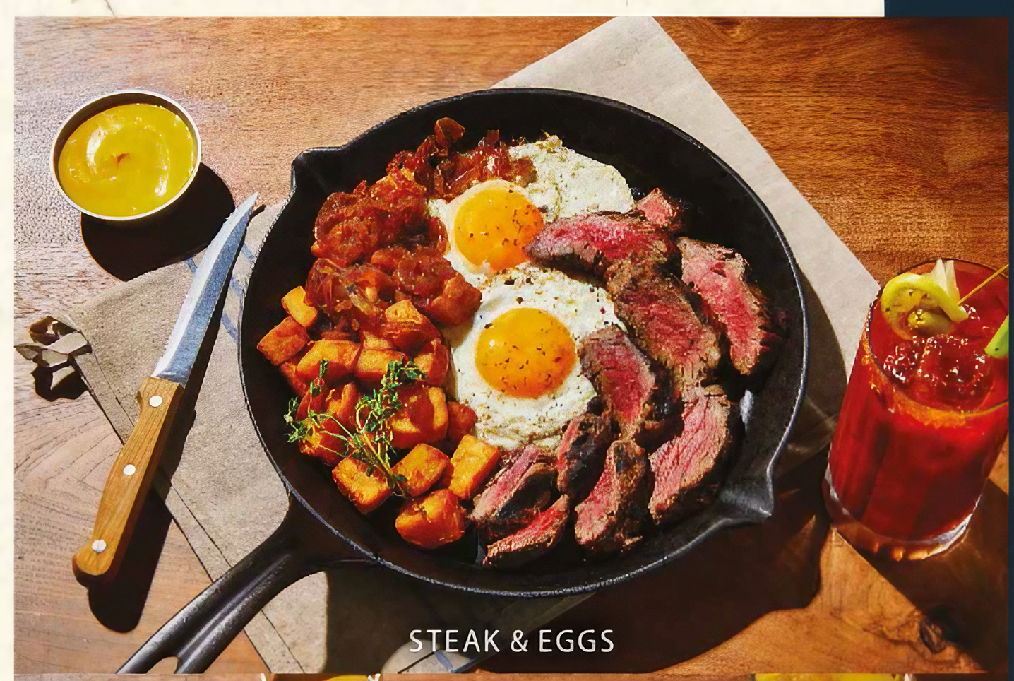 Steak and Eggs — sliced 5oz fillet tail with fried eggs