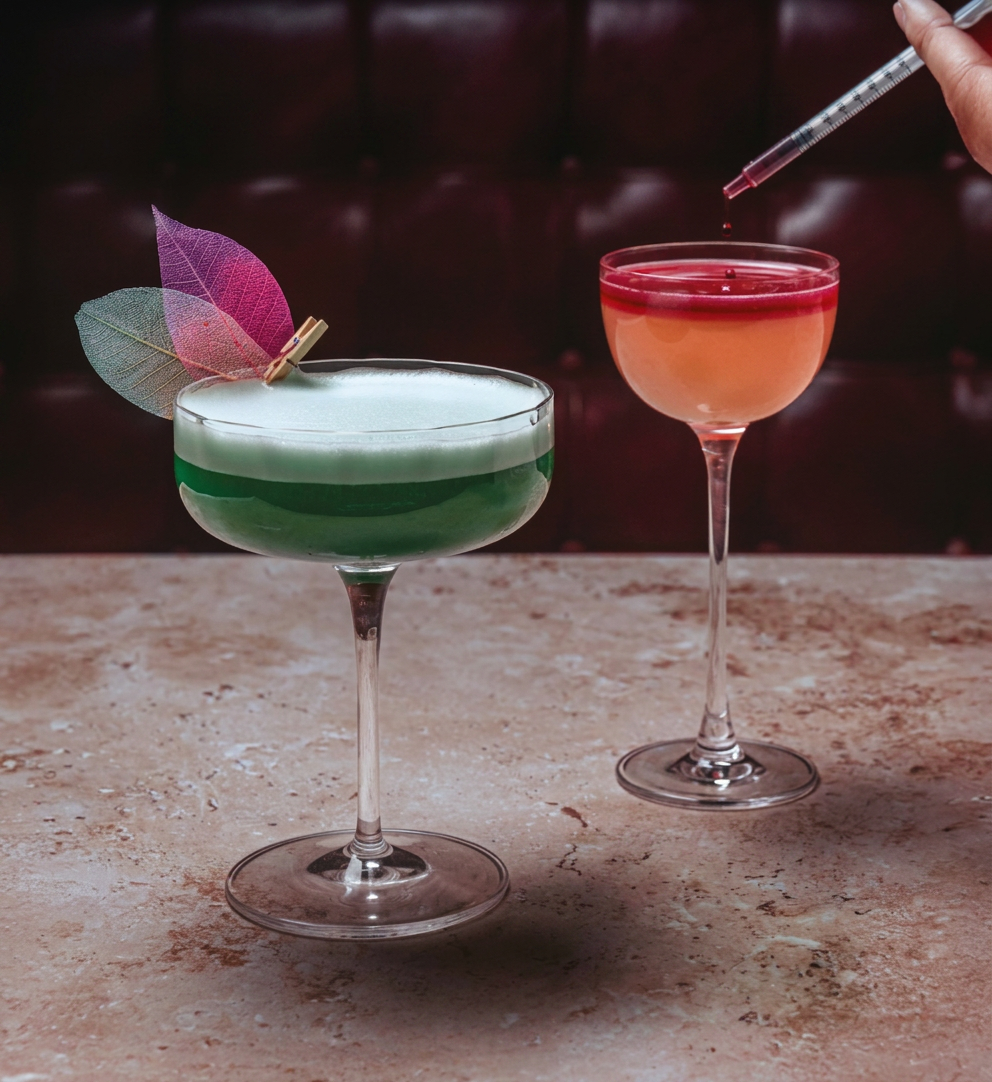 Two cocktails: Gaslight Glamour and Red Velvet Affair